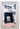 Person standing in front of a building with 'Bradley Beauty' sign, promotional text overlay.