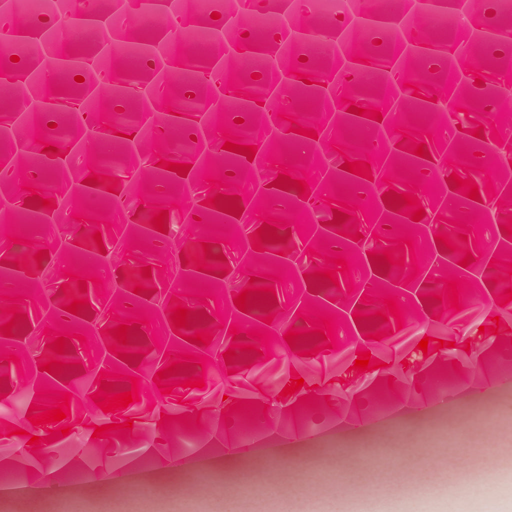 Closeup of Supracor Bath Mitt showing honeycomb design and texture.