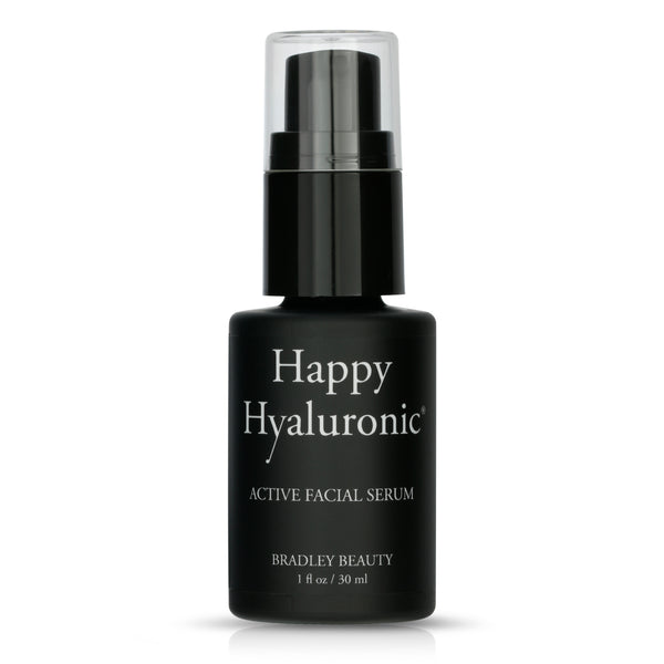 Happy Hyaluronic in a black glass bottle with pump dispending cap.