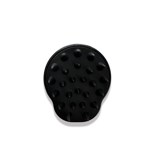 Image of the massaging side of the massaging shampoo brush by CALA. Features silicone multiple cone-shaped points.