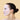 Woman side profile of face wearing facial sheet mask
